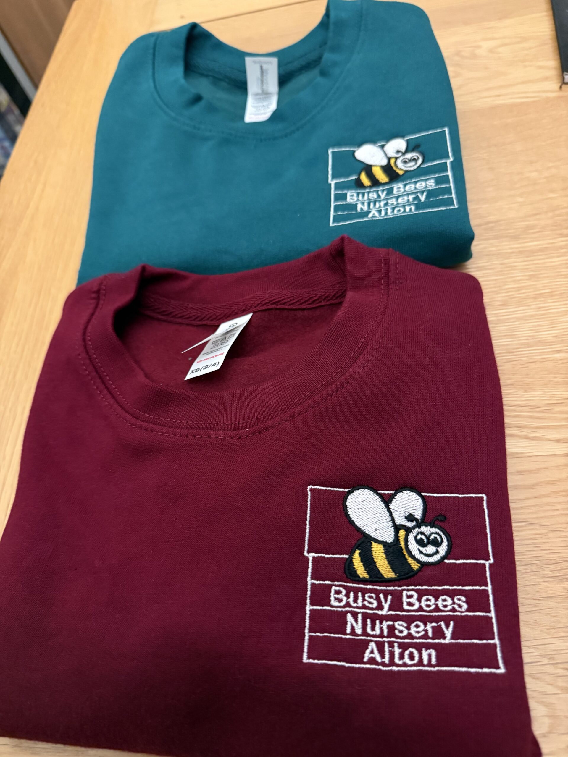 Busy Bees nursery embroidered sweatshirts produced by YAPO