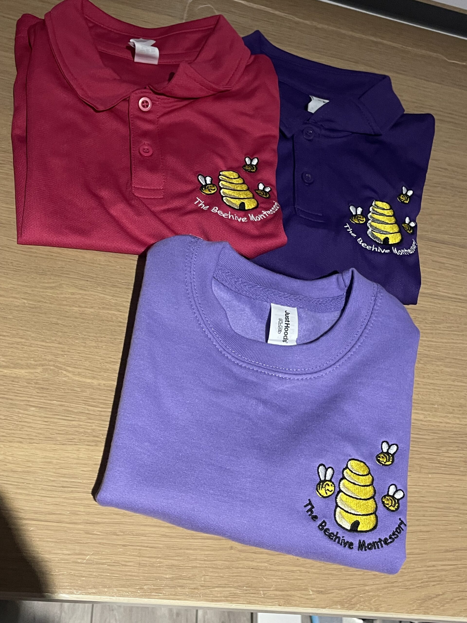 Beehive Montessori embroidered nursery clothing produced by YAPO